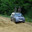 Subaru Forester выезжает на колею (2008 год). Редакционное фото, фотограф Юлия Ухина / Фотобанк Лори
