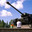 Отец с ребенком возле танка ИС-2 (2008 год). Редакционное фото, фотограф Игорь Момот / Фотобанк Лори