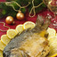 Карп, фаршированный мясом курицы с хлебом и грибами, на новогоднем праздничном столе. Стоковое фото, фотограф Лисовская Наталья / Фотобанк Лори