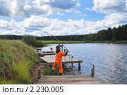 Рыбак делает заброс (2009 год). Редакционное фото, фотограф Алёшина Оксана / Фотобанк Лори