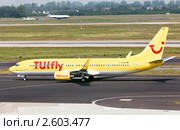 Самолет Boeing 737-800 немецкой авиакомпании TUIfly, входящей в крупнейшую туристическую компанию TUI, перед взлетом (2011 год). Редакционное фото, фотограф Николай Винокуров / Фотобанк Лори