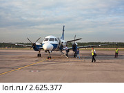 Самолет Saab 340 на аэродроме. Редакционное фото, фотограф Кекяляйнен Андрей / Фотобанк Лори