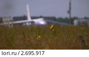 Самолет АН24-100 пред взлетом (2011 год). Редакционное видео, видеограф Игорь Тирский / Фотобанк Лори