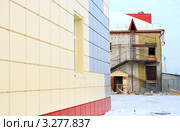 Отделка фасадов здания металлическими кассетами (2012 год). Редакционное фото, фотограф Анатолий Матвейчук / Фотобанк Лори
