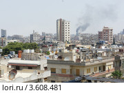 Сирия. Город Хомс. Черный дым (2012 год). Стоковое фото, фотограф Алексей Бахвалов / Фотобанк Лори