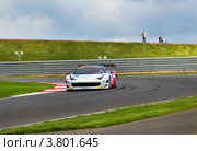 Автомобиль Ferrari 458 команды Russian Bears участвует в Чемпионате Eвропы FIA GT3 на трассе "Moscow Raceway" в Подмосковье (2012 год). Редакционное фото, фотограф Николай Винокуров / Фотобанк Лори