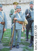 Солдат УСС, выравнивающий усы. Реконструкция событий 1919 года в г. Каменце-Подольском (2012 год). Редакционное фото, фотограф Красилов Игорь / Фотобанк Лори