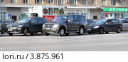 Москва. Машины на ул. Новослободская готовятся к левому повороту (2012 год). Редакционное фото, фотограф Ярослав Каминский / Фотобанк Лори