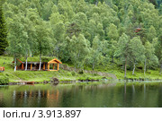 Домики на берегу фьорда (2008 год). Стоковое фото, фотограф Estet / Фотобанк Лори