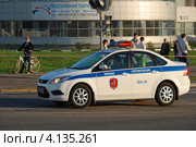 Автомобиль "Военная автоинспекция" идет по улице Ходынский бульвар, Москва (2012 год). Редакционное фото, фотограф lana1501 / Фотобанк Лори