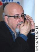 Режиссер, журналист, теле- и радиоведущий Давид Шнейдеров (2013 год). Редакционное фото, фотограф Александр Легкий / Фотобанк Лори