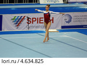 Золотой призер в Вольных упражнениях Ксения Афанасьева на чемпионате Европы по спортивной гимнастике 2013 года. Москва, СК "Олимпийский" Редакционное фото, фотограф Игорь Долгов / Фотобанк Лори