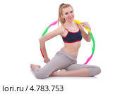 Спортивная девушка позирует сидя с обручем хула хупом. Стоковое фото, фотограф Elnur / Фотобанк Лори