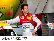 Немецкий гонщик Майк Роккенфеллер выиграл российский этап DTM на треке Moscow Raceway в Подмосковье (2013 год). Редакционное фото, фотограф Николай Винокуров / Фотобанк Лори