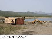 Грейдер рядом с хвостохранилицем. Месторождение Бадран. Стоковое фото, фотограф Анна Зеленская / Фотобанк Лори