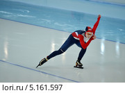 Скоростной бег на коньках, конькобежка на дистанции (2012 год). Редакционное фото, фотограф Анна Мартынова / Фотобанк Лори