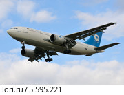 Самолет "Airbus A310" (бортовой YA-CAV) авиакомпании "Ariana Afghan Airlines" на посадке в Шереметьеве (2011 год). Редакционное фото, фотограф Alexei Tavix / Фотобанк Лори
