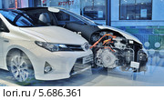 "Auris Hybrid Toyota Touring Sports" - новинка 2012 года: 2 половинки автомобиля в продольном разрезе (2014 год). Редакционное фото, фотограф Вера Смолянинова / Фотобанк Лори