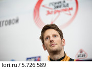 Портрет крупным планом пилота Формулы 1 Ромена Грожана (команда Lotus F1 Team) на пресконференции "Гонка звезд" на приз журнала "За рулем", Москва 23 февраля 2014. Редакционное фото, фотограф Николай Винокуров / Фотобанк Лори