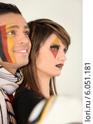 Two engrossed German football fans. Стоковое фото, фотограф Phovoir Images / Фотобанк Лори