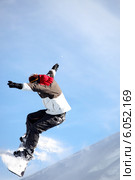 Man jumping with snowboard. Стоковое фото, фотограф Phovoir Images / Фотобанк Лори