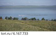 Озеро Шира (поселок Жемчужный, Хакасия). Моторная лодка и гидроцикл на воде. Стоковое видео, видеограф Konstantin Kartashov / Фотобанк Лори