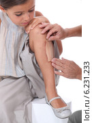 Band-aid on little girl's leg. Стоковое фото, фотограф Phovoir Images / Фотобанк Лори