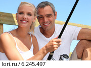 Couple fishing. Стоковое фото, фотограф Phovoir Images / Фотобанк Лори