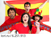 A group of people show their support of the Spanish football team. Стоковое фото, фотограф Phovoir Images / Фотобанк Лори