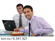 Business professionals posing for the camera. Стоковое фото, фотограф Phovoir Images / Фотобанк Лори