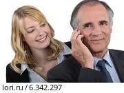 Woman admiring her boss. Стоковое фото, фотограф Phovoir Images / Фотобанк Лори