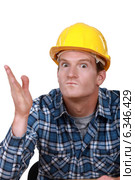 Tradesman looking ready to hit somebody. Стоковое фото, фотограф Phovoir Images / Фотобанк Лори
