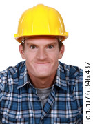 Tradesman making a face. Стоковое фото, фотограф Phovoir Images / Фотобанк Лори
