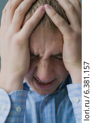 Males sore headache. Стоковое фото, агентство Ingram Publishing / Фотобанк Лори