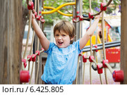 Girl at action-oriented playground. Стоковое фото, фотограф Яков Филимонов / Фотобанк Лори