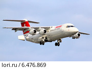 Самолёт BAE Systems Avro 146-RJ100 авиакомпании Swiss International Air Lines (2014 год). Редакционное фото, фотограф Art Konovalov / Фотобанк Лори