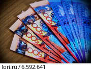 Деньги Казахстана, банкноты тенге. Стоковое фото, фотограф ElenArt / Фотобанк Лори