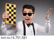 Funny chess player with board. Стоковое фото, фотограф Elnur / Фотобанк Лори
