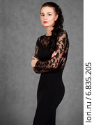 Portrait of a young attractive woman in a black evening dress. Стоковое фото, фотограф Art Konovalov / Фотобанк Лори