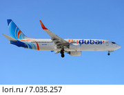 Boeing 737 (бортовой A6-FEP) авиакомпании Flydubai на посадке во Внукове (2015 год). Редакционное фото, фотограф Alexei Tavix / Фотобанк Лори
