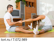 couple doing regular exercises together. Стоковое фото, фотограф Яков Филимонов / Фотобанк Лори