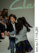 NEW YORK, NY - OCTOBER 19: Models perform on the runway during the Clarks preview at petitePARADE Kids Fashion Week at Bathhouse Studios on October 19, 2014 in New York City. Редакционное фото, фотограф Anton Oparin / Фотобанк Лори