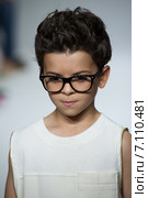 NEW YORK, NY - OCTOBER 19: A model walks the runway during the Dillonger Clothing preview at petitePARADE Kids Fashion Week at Bathhouse Studios on October 19, 2014 in New York City. Редакционное фото, фотограф Anton Oparin / Фотобанк Лори