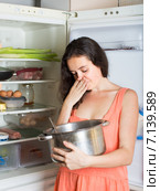 Woman holding her nose because of bad smell. Стоковое фото, фотограф Яков Филимонов / Фотобанк Лори