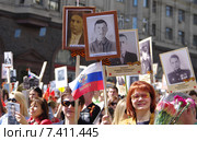 Москва, Тверская улица. Участники народно-патриотической акции "Бессмертный полк" с портретами фронтовиков, 9 мая 2015 года. Редакционное фото, фотограф Илюхина Наталья / Фотобанк Лори