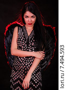Beautiful young woman with black angel wings. Стоковое фото, фотограф Art Konovalov / Фотобанк Лори