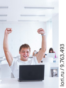 Portrait of a very happy young, male college student. Стоковое фото, фотограф Viktor Cap / PantherMedia / Фотобанк Лори