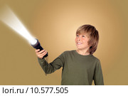 Child with a flashlight looking for something . Стоковое фото, фотограф Gelpi José Manuel / PantherMedia / Фотобанк Лори