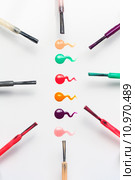 Set of multicolored nail polish brushes and drops. Стоковое фото, фотограф Sergiy Artsaba / PantherMedia / Фотобанк Лори