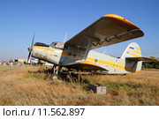 Авиа-шоу в станице Романовская. Самолёт АН-2 на лётном поле (2015 год). Редакционное фото, фотограф A Челмодеев / Фотобанк Лори